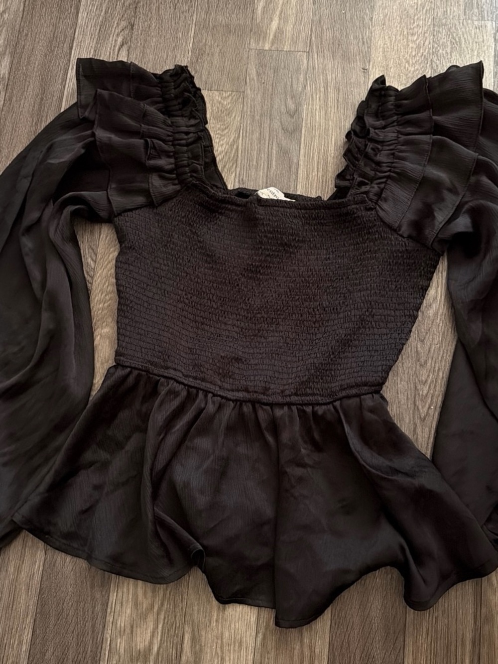 entro Black Ruffled Smocked Peplum Blouse